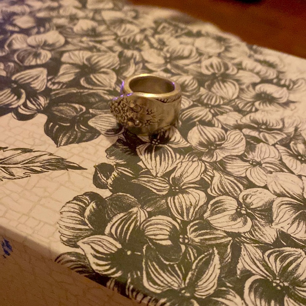 This is a silver 1972 spoon ring